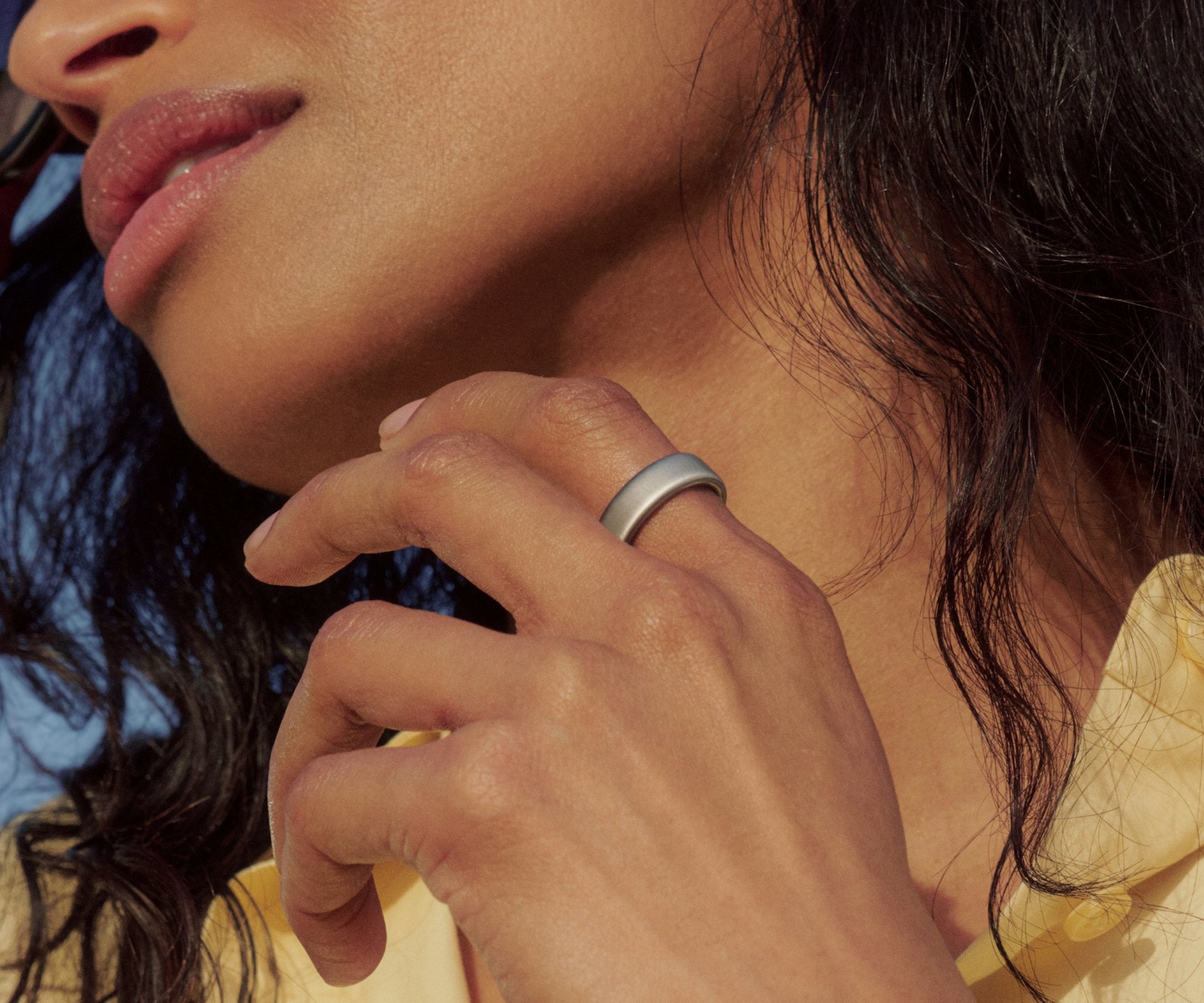 Titanium smart health ring in Brushed Silver — worn