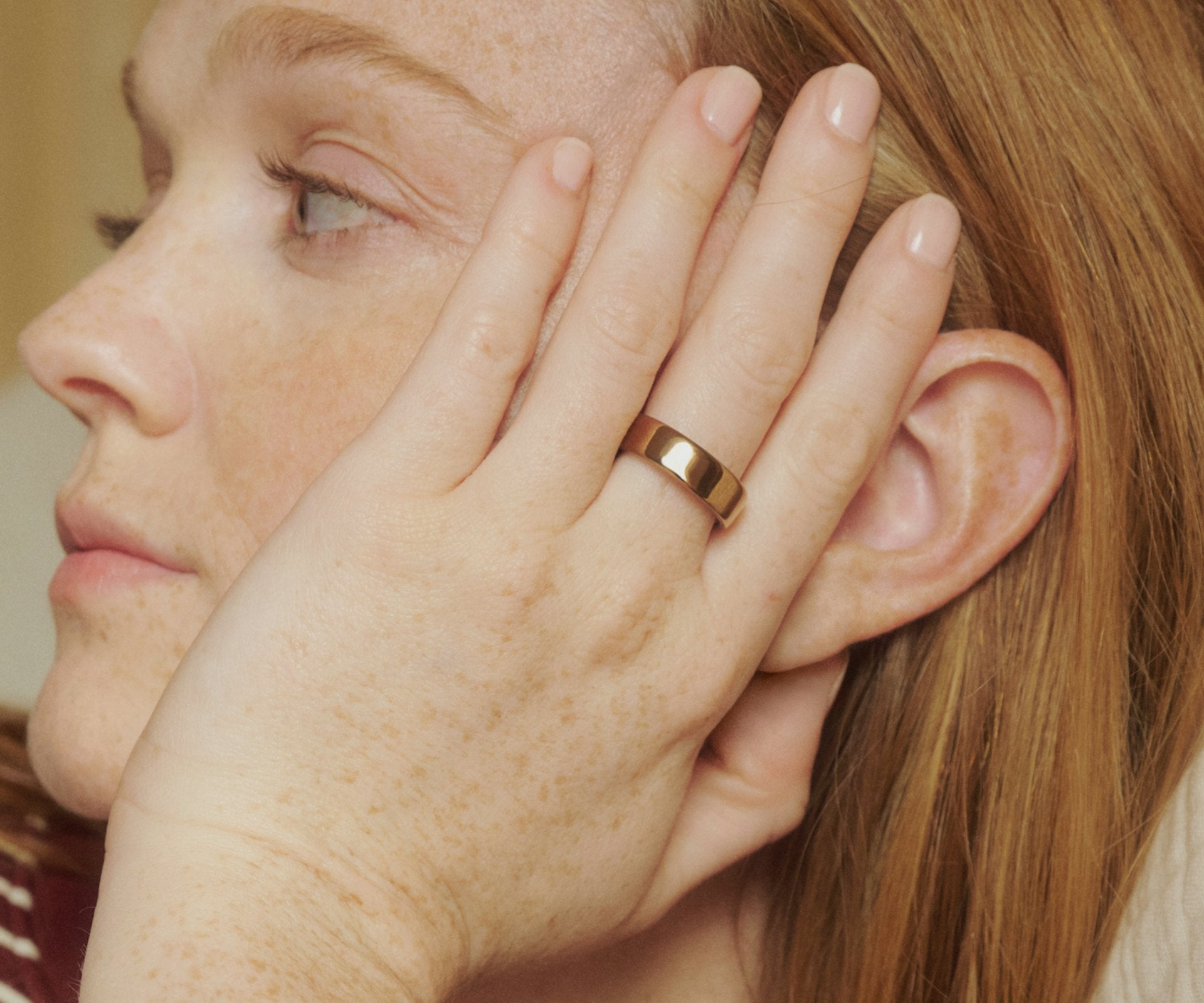 Titanium smart health ring in Deep Rose — worn