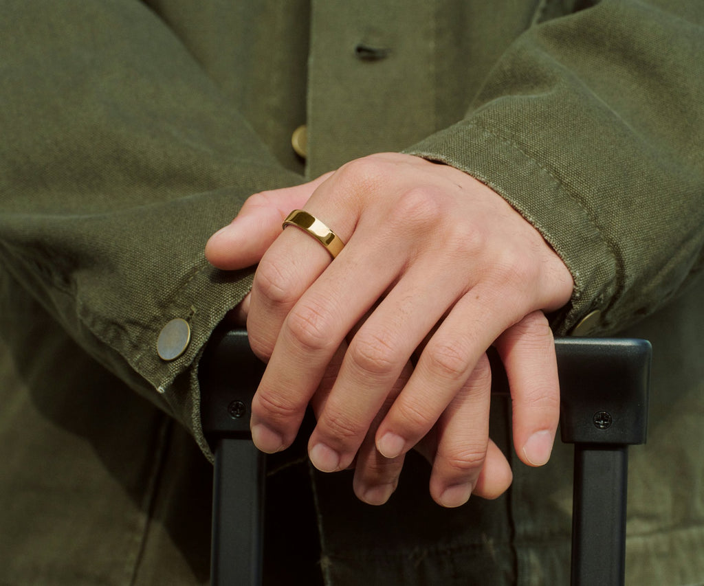 Titanium smart health ring in Gold — worn