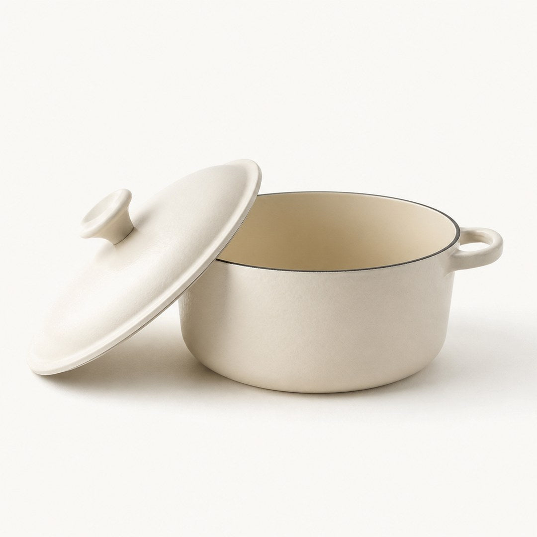 Enamel dutch oven with the lid open showing the enamel interior
