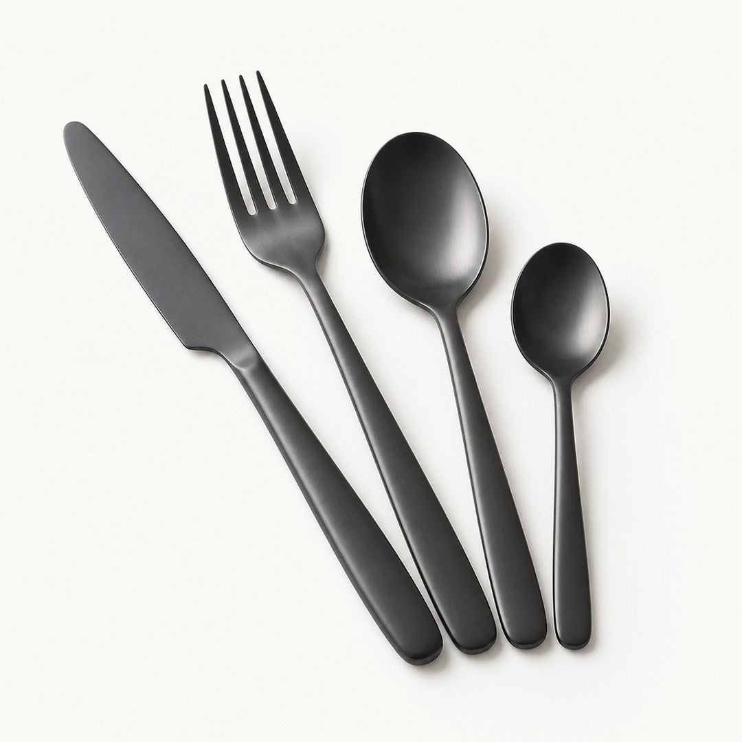 Matte flatware fanned out in close-up showing the finish