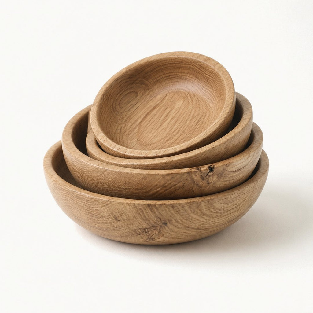 Oak serving bowls nested in a stack showing the turned interior