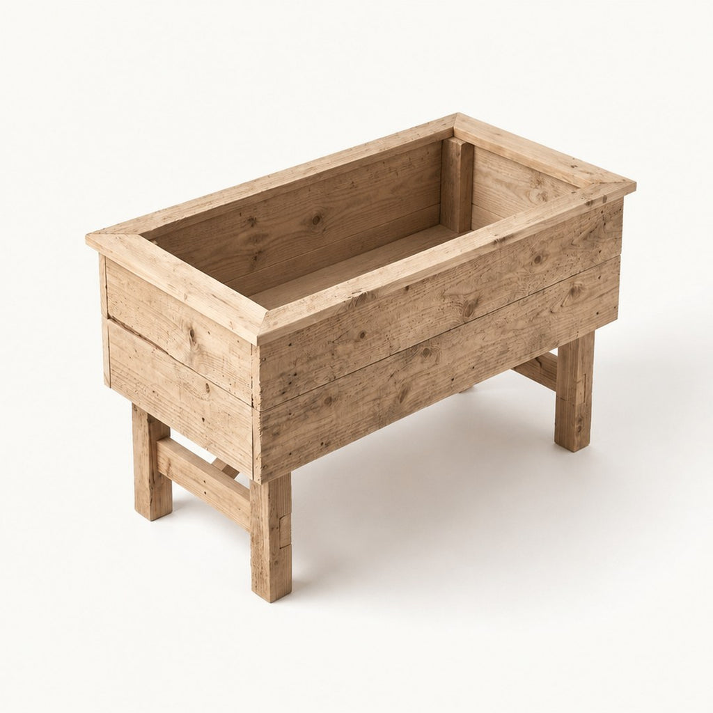 Raised cedar planter seen from above showing the open bed
