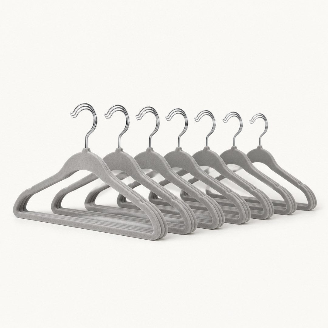 Velvet hangers fanned out separately showing the hook and shoulder profile