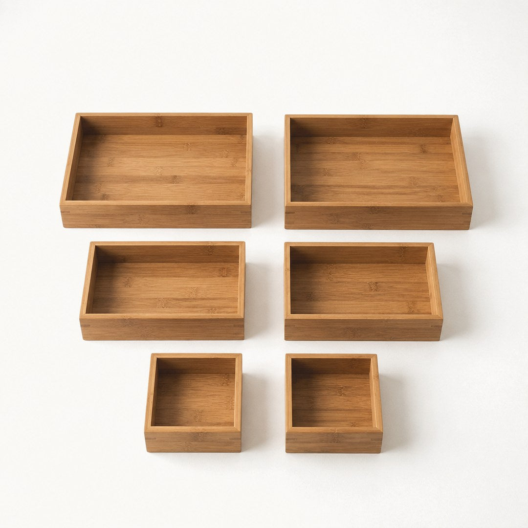 Six drawer organiser trays laid out separately in two rows