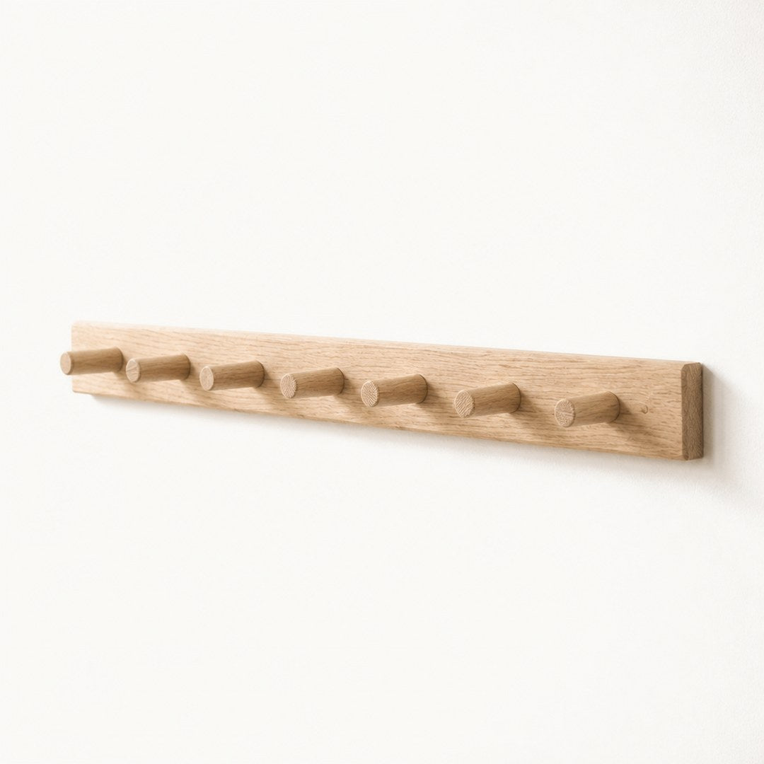 Peg rail seen along its length showing the peg projection and rail thickness