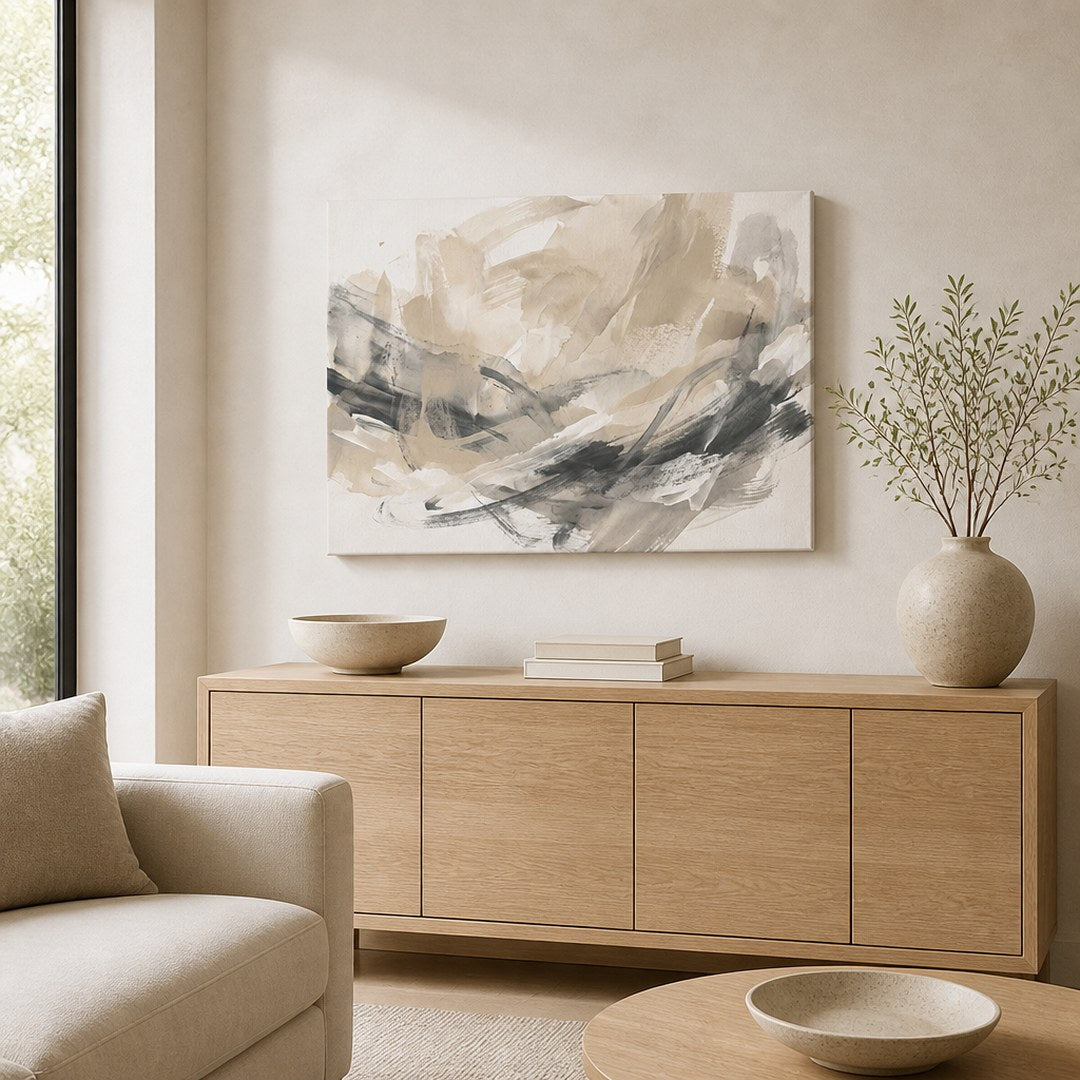 Abstract canvas print hung above an oak sideboard in a living room