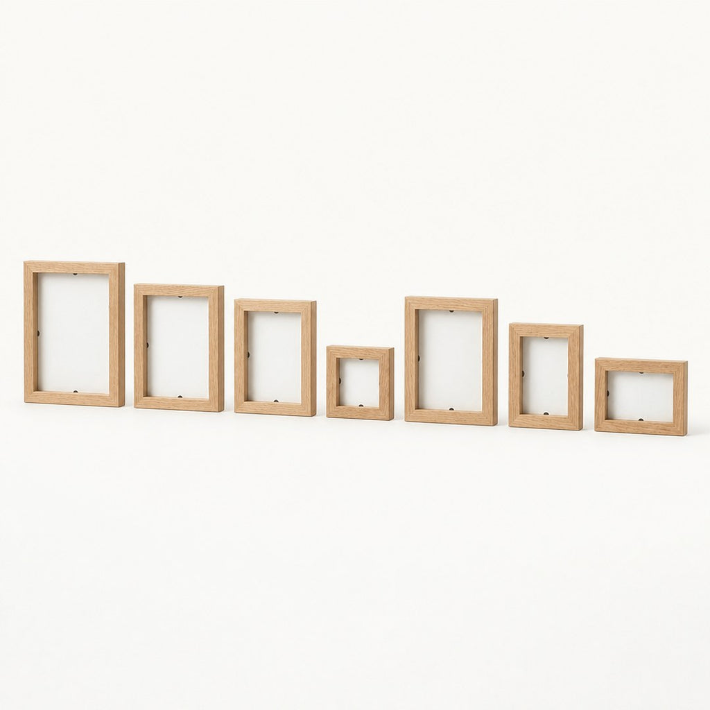 Seven gallery frames laid out separately side by side