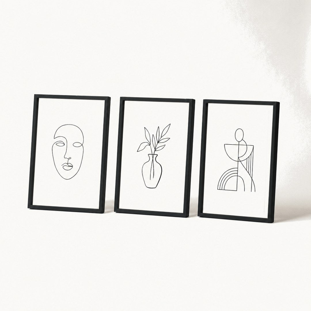 Set of three line art prints fanned side by side showing frame thickness