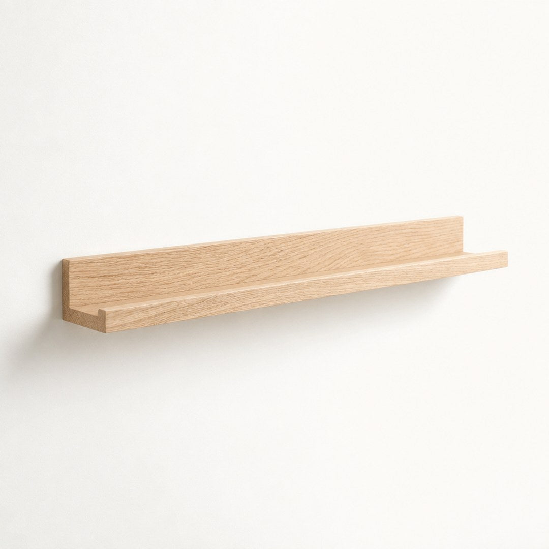 Picture ledge seen from below showing the front lip and slim depth