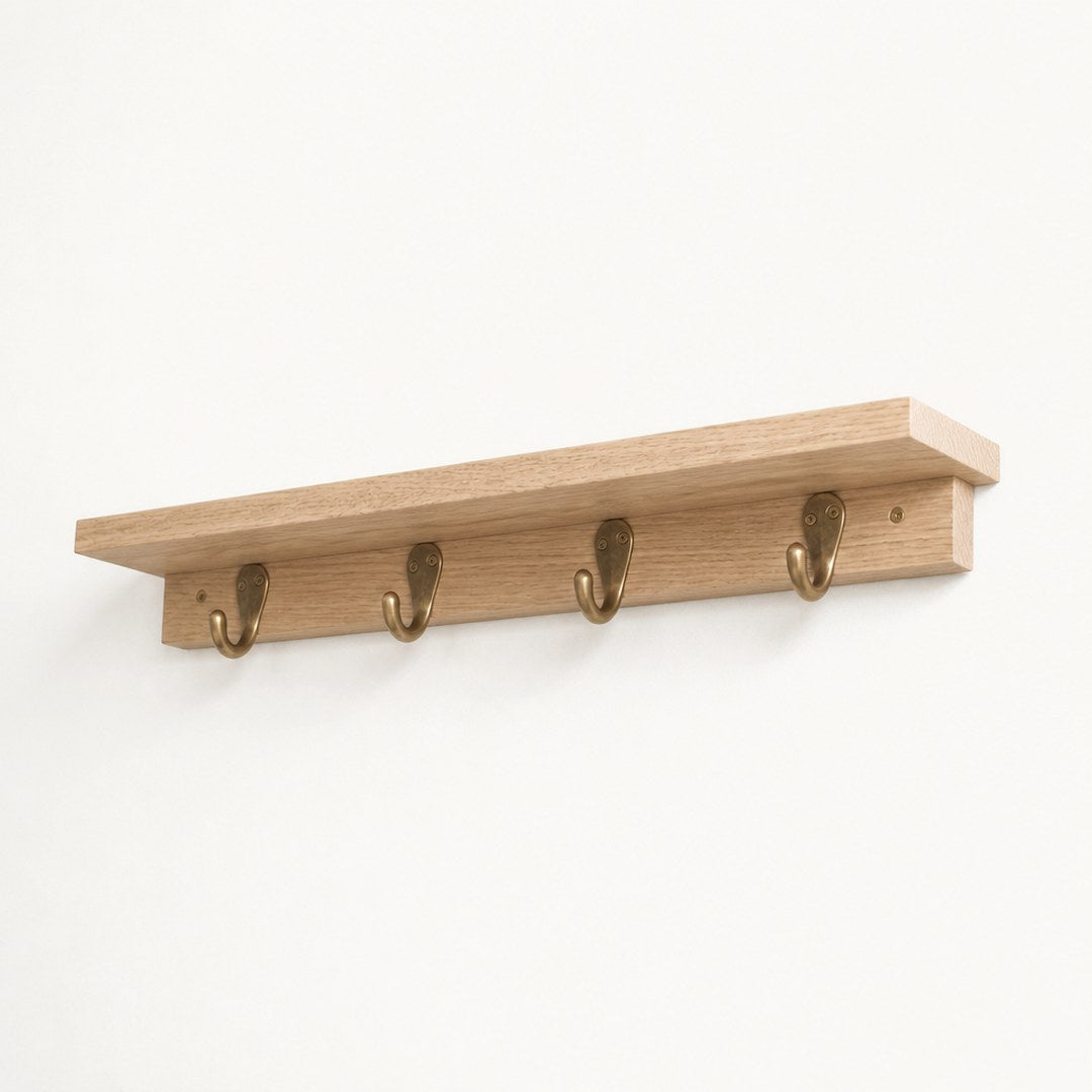 Shelf with hooks seen from below showing the shelf underside and hooks